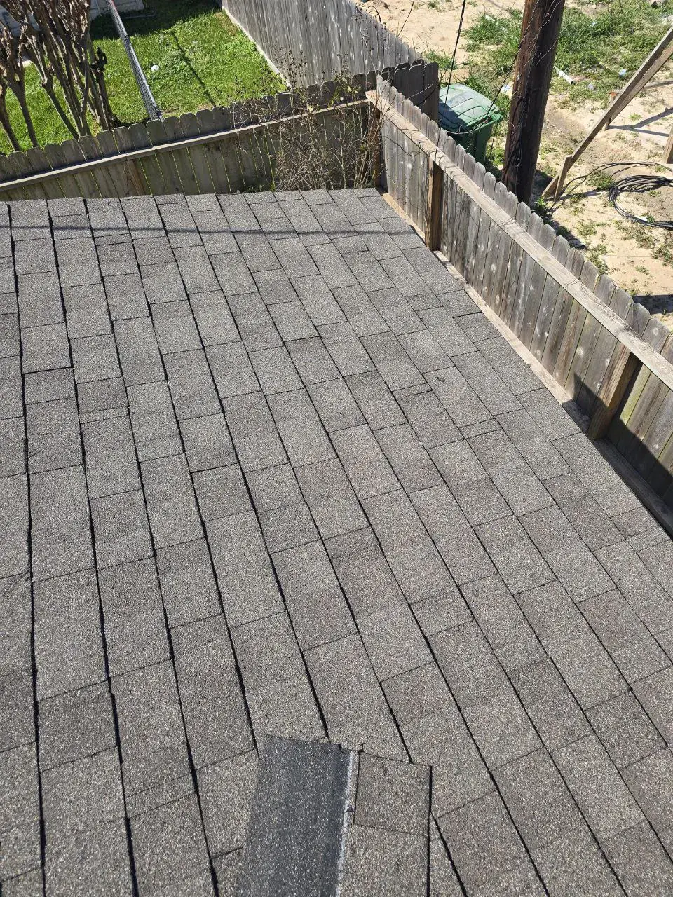 Roofing repairs Houston - Ridge cap installation with architectural shingles for finished edges