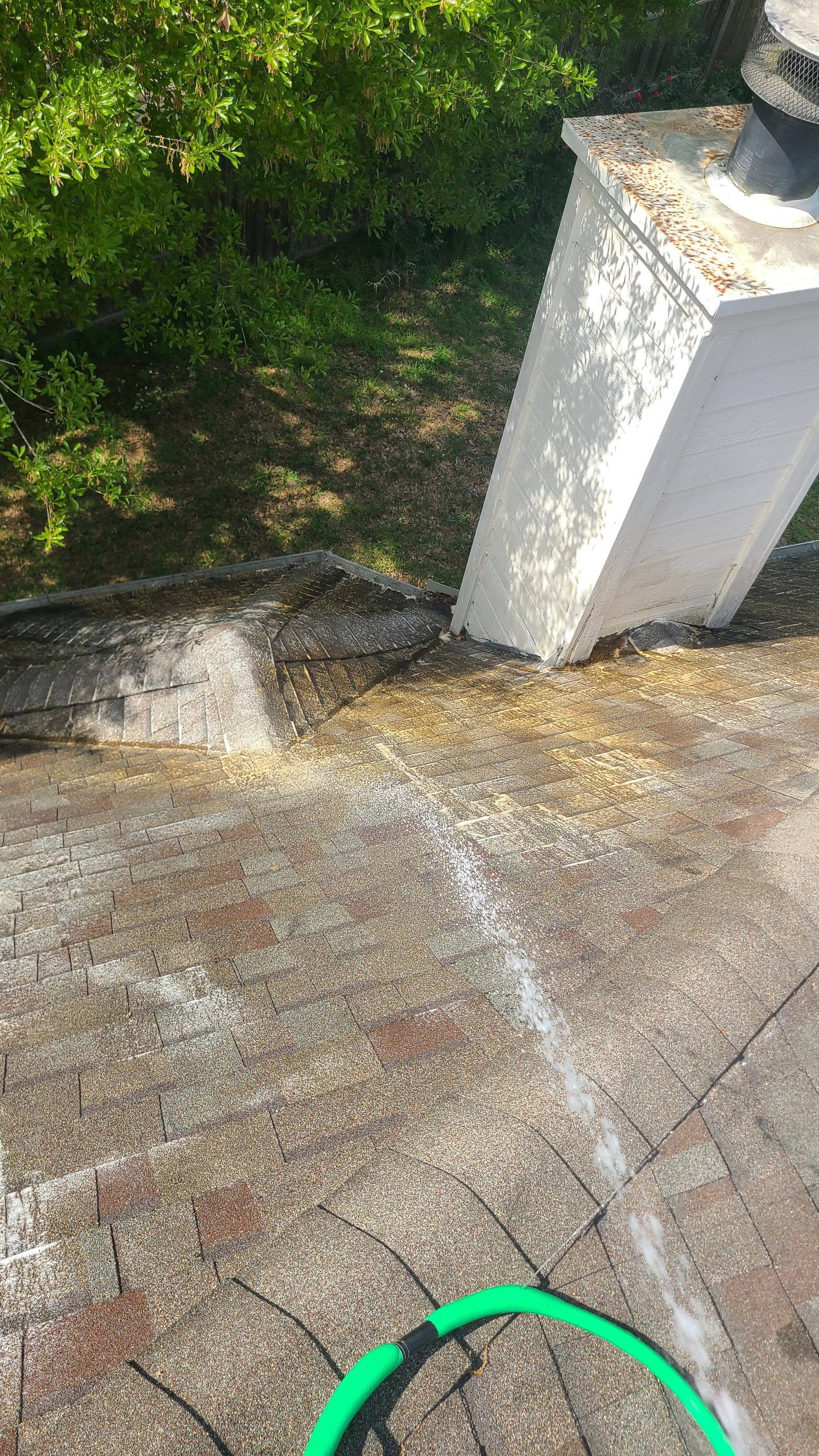 Roof soft washing service in Houston, TX